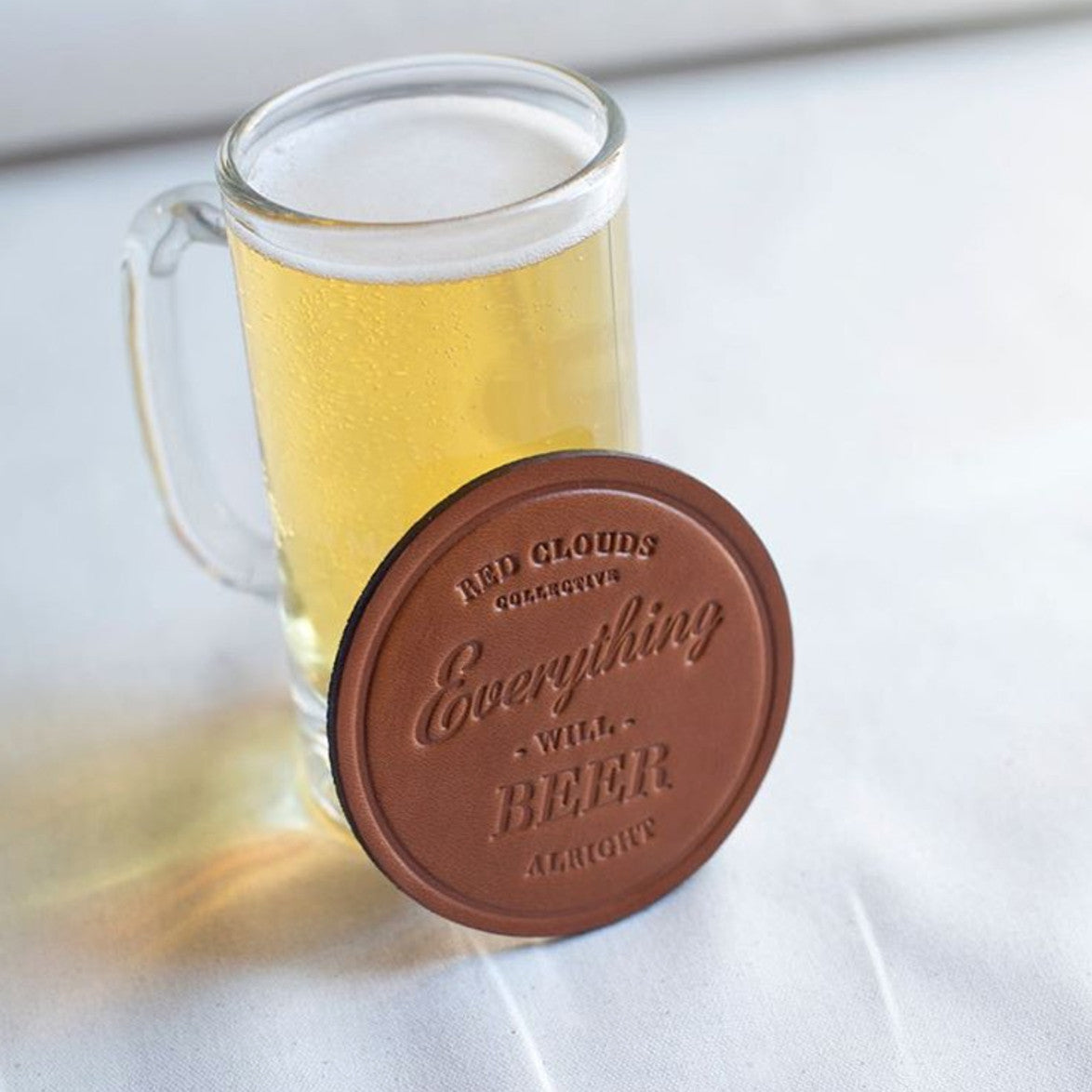 leather coaster, beer coaster, drink in style, made in usa, vegetable tanned leather, red clouds coaster