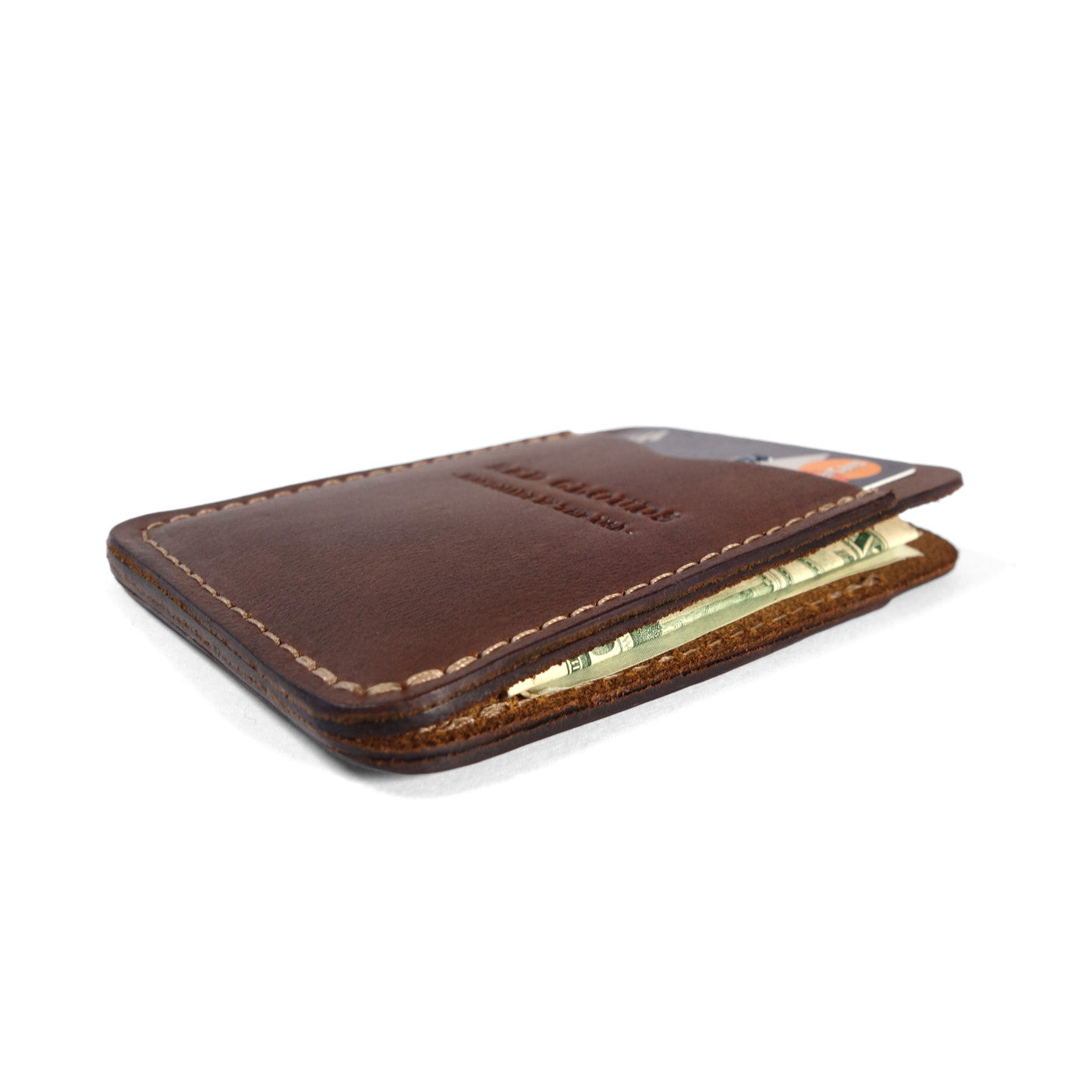 Frontside wallet. Card wallet. slim card case. leather card wallet. For those who like to keep their wallets in their front pockets. Slim enough to comfortably carry and large enough to fit your essential cards and some cash.  3/4oz Herman Oak Vegetable-Tanned Leather 2 Card-Slots, 1 center card slot