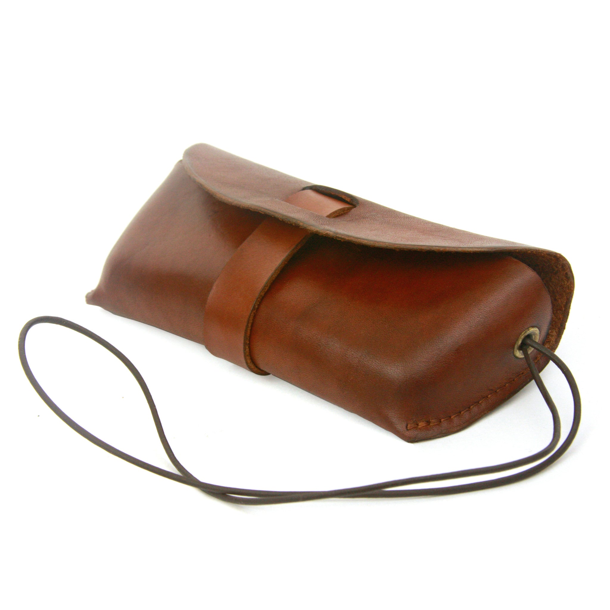 Glasses case, leather glasses case, sun glasses case, croakie, handmade leather case, leather case to keep your glasses protected and secure, featuring a multi-functional leather croakie for hanging either the case or your glasses around your neck.