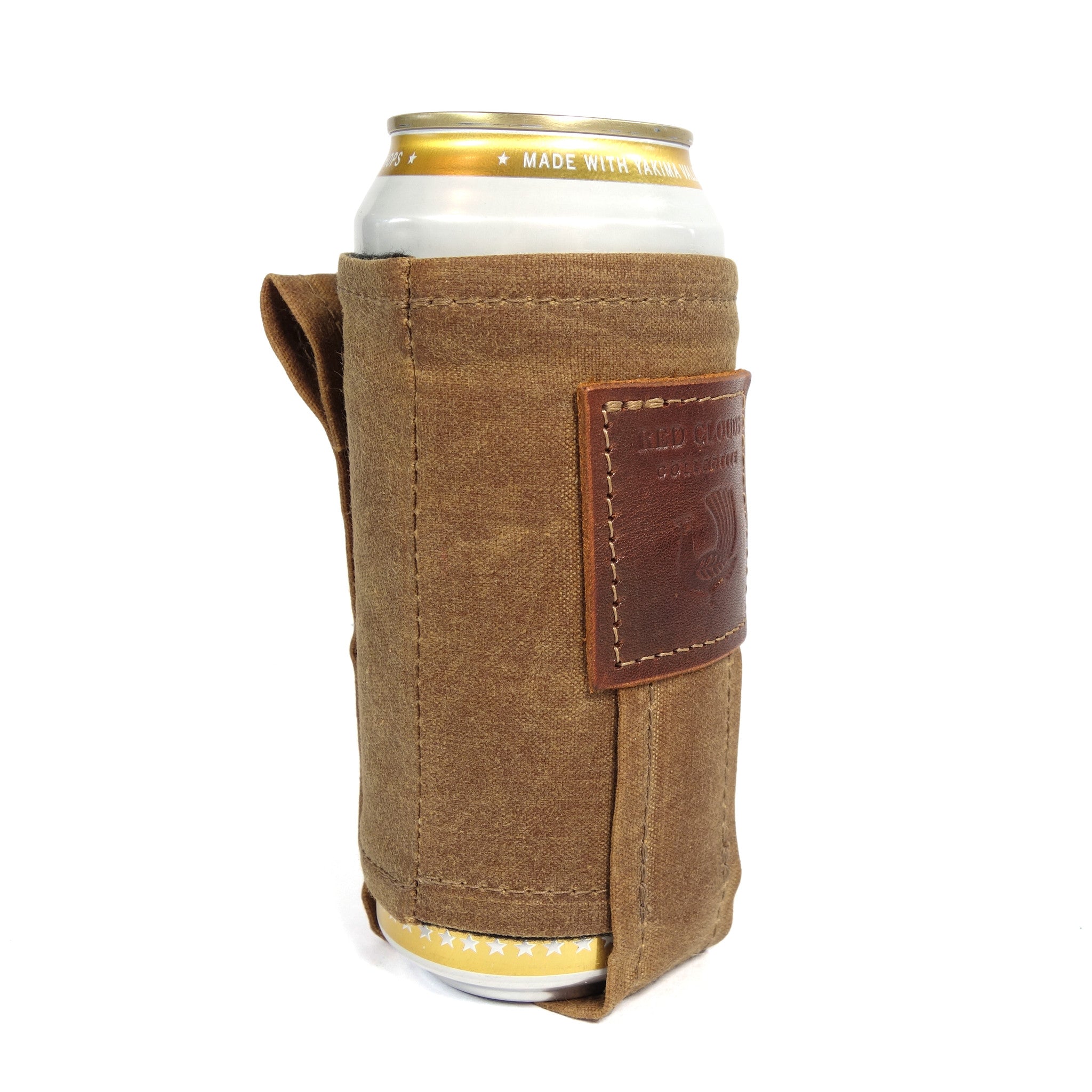 Magnetic Koozie, waxed canvas koozie, leather koozie, rare earth magnets, beer koozie, tallboy koozie, red clouds koozie, This is not your normal koozie. It uses very strong, rare earth magnets to hold the weight of your full beverage attached to the fridge, stove, your car or any other metal surface while you are working or playing. A clever back loop also lets you attach a string and wear the koozie around your neck.