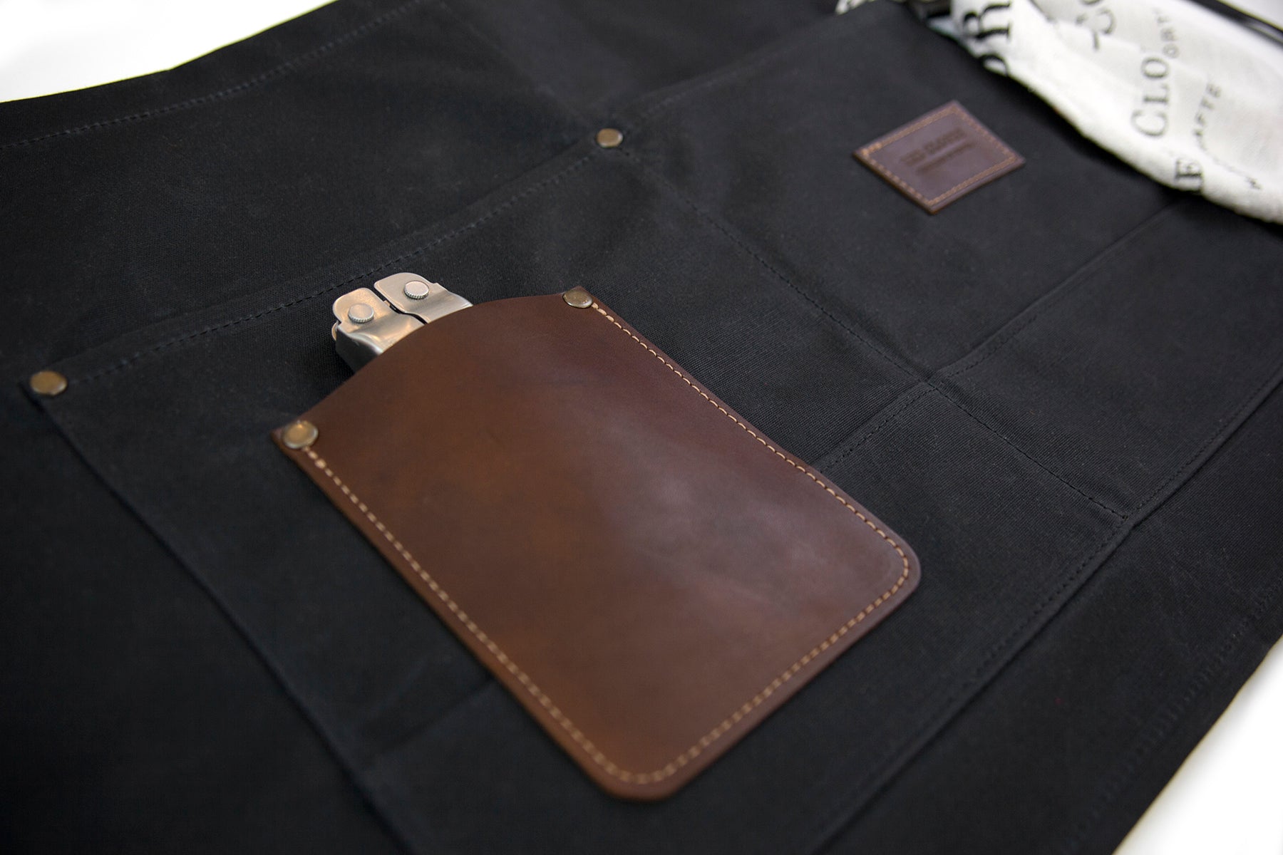 carpenter apron, shop apron, tattoo apron, canvas apron, denim apron, waxed canvas, waxed apron, quality apron, made in usa, made in america, durable, red clouds collective
