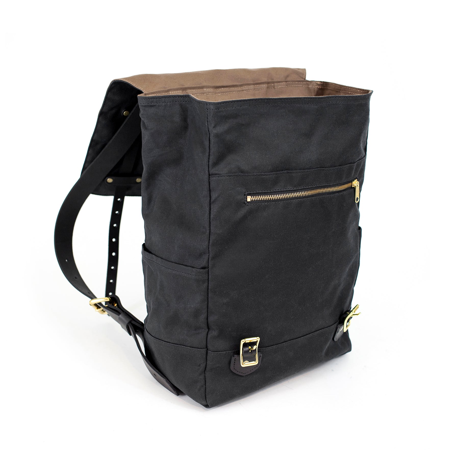 Black leather backpack with waxed canvas roll to close top and leather  front pocket
